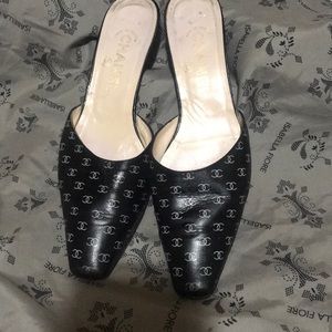 Chanel Vintage Slip Ons with Chanel logo.